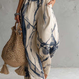 MARCELLA | HALTER WIDE-LEG JUMPSUIT
